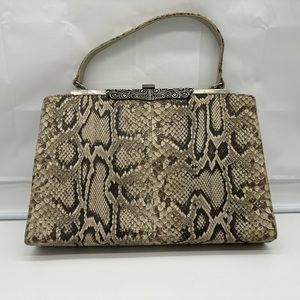 Snake skin clutch